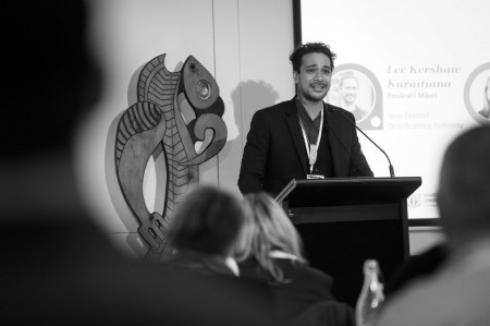 Facilitator at lecturn bw