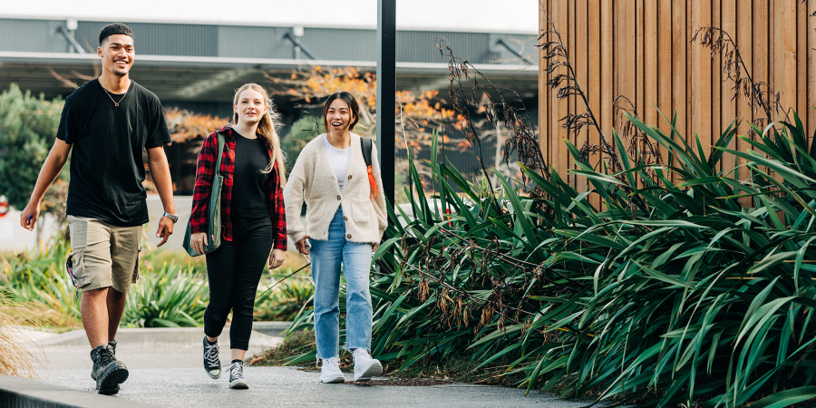 Three learners walking outside 1920x960