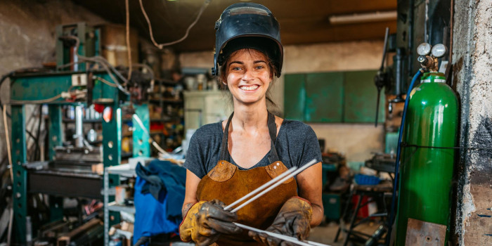 Apprentice in engineering workshop