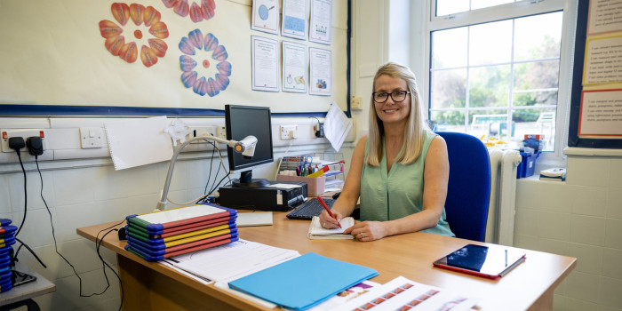 Career practitioner at their desk